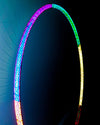 LED Rainbow Hula Hoop with rainbow design and 3-point counterbalanced construction for smooth spinning