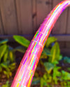 Pink holographic hula hoop tape available in 3/4 inch and 1 inch widths for hoop making