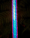 Reflective Moonshine hula hoop glowing under camera flash